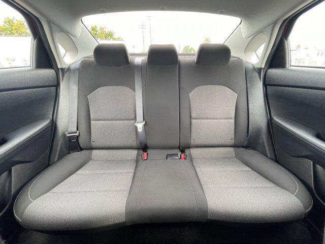 Photo of 2023 Fire Orange Kia Forte