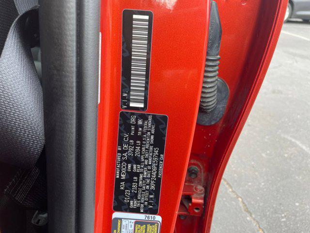 Photo of 2023 Fire Orange Kia Forte