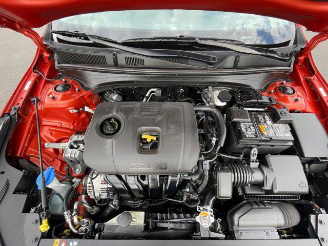 Photo of 2023 Fire Orange Kia Forte