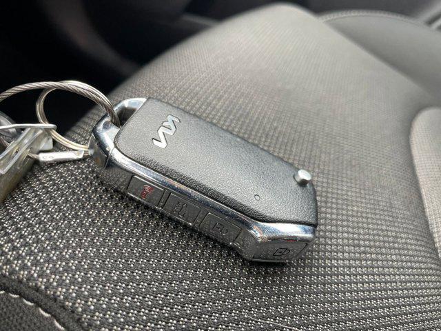 Photo of 2023 Fire Orange Kia Forte