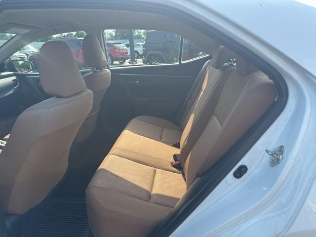 Photo of 2014 Super White Toyota Corolla
