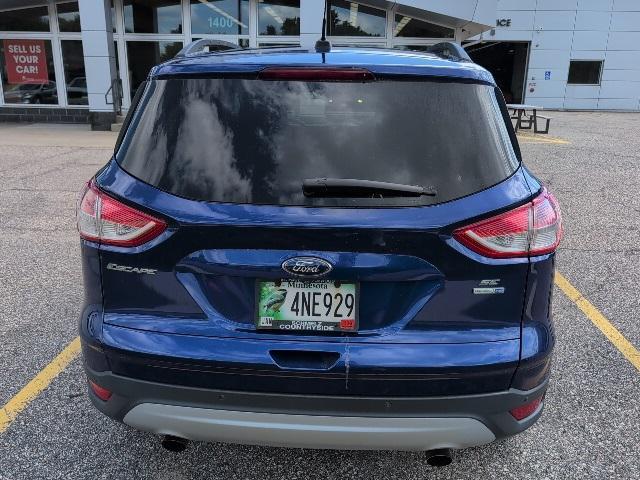 Photo of 2014 Deep Impact Blue Ford Escape