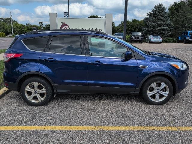 Photo of 2014 Deep Impact Blue Ford Escape