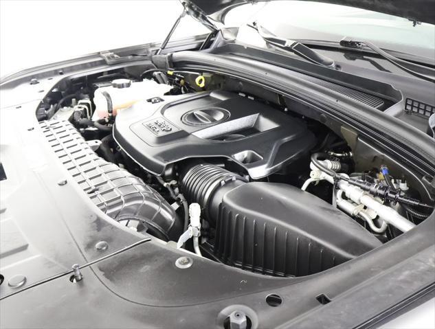 Photo of 2022 Rocky Mountain Pearlcoat Jeep Grand Cherokee L