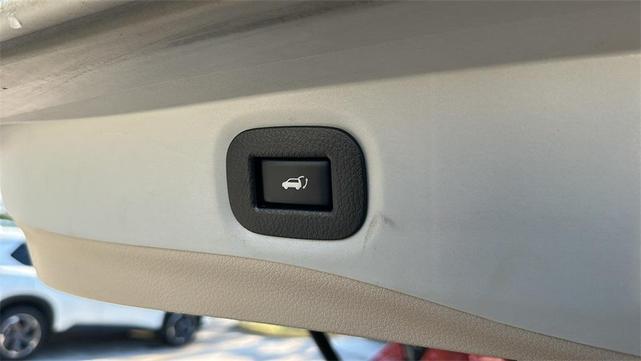 Photo of 2014 Cayenne Red Nissan Rogue
