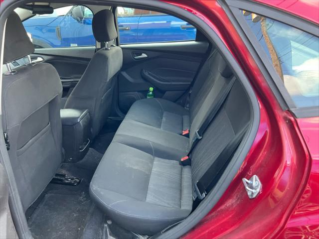 Photo of 2017 Ruby Red Metallic Tinted Clearcoat Ford Focus