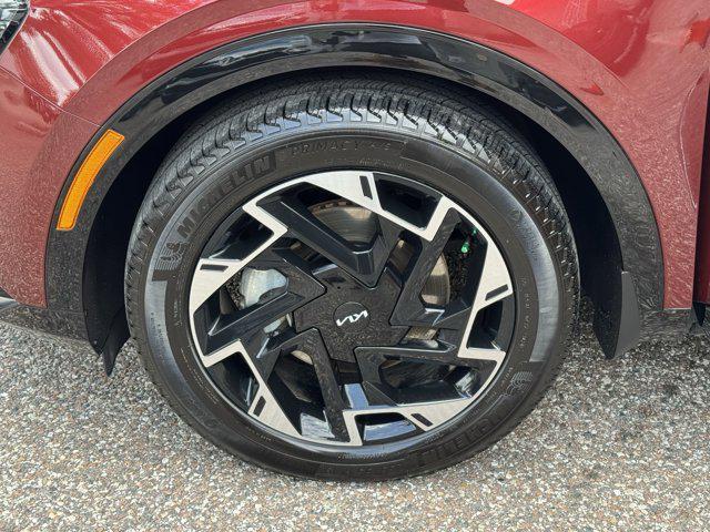 Photo of 2025 Dawning Red Kia Sportage