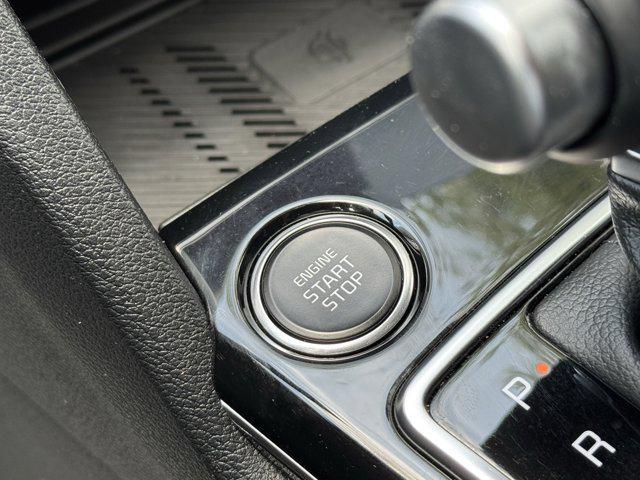 Photo of 2025 Dawning Red Kia Sportage