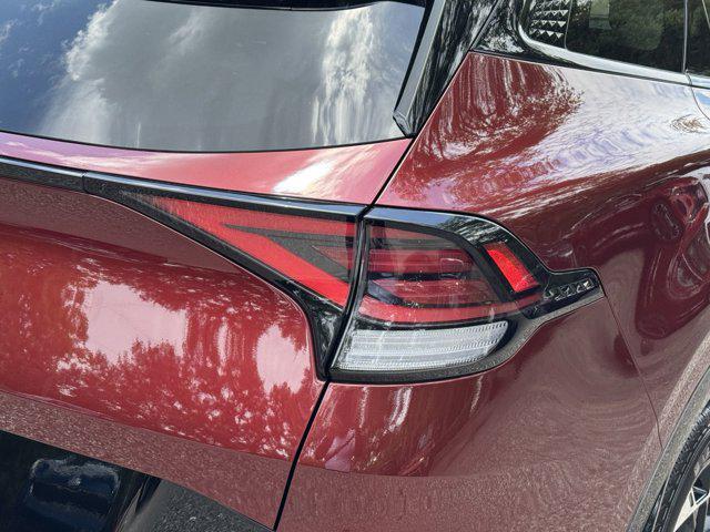 Photo of 2025 Dawning Red Kia Sportage