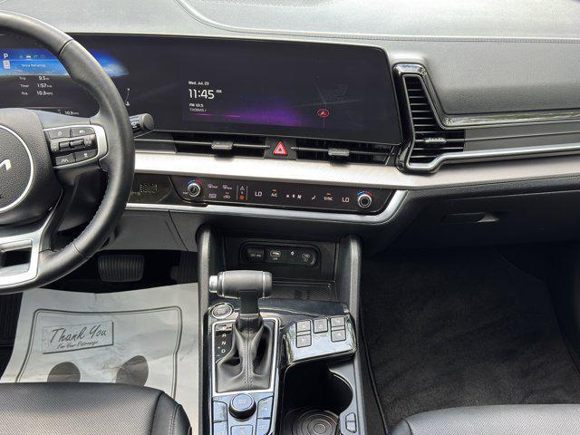 Photo of 2025 Dawning Red Kia Sportage