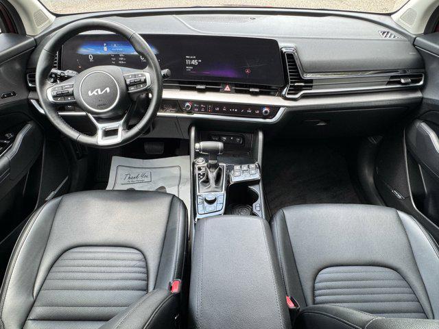 Photo of 2025 Dawning Red Kia Sportage