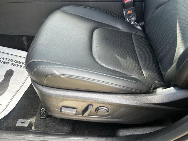 Photo of 2025 Ebony Black Kia Sportage