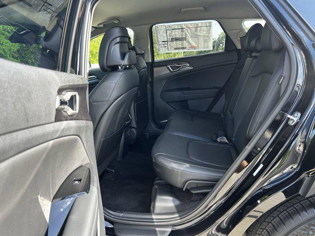 Photo of 2025 Ebony Black Kia Sportage