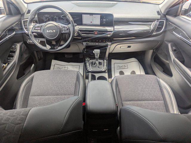 Photo of 2024 Dark Ocean Blue/White Roof Kia Seltos