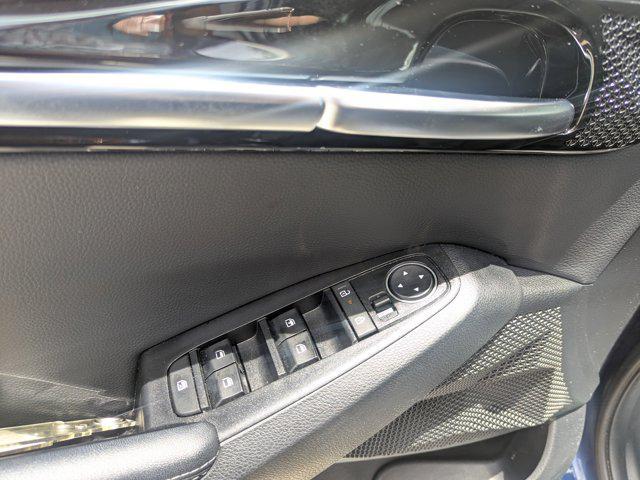 Photo of 2024 Dark Ocean Blue/White Roof Kia Seltos