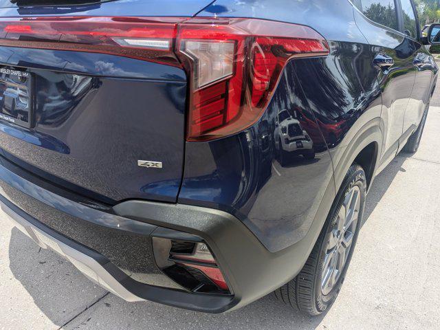 Photo of 2024 Dark Ocean Blue/White Roof Kia Seltos