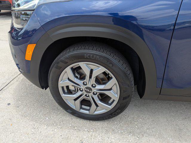 Photo of 2024 Dark Ocean Blue/White Roof Kia Seltos