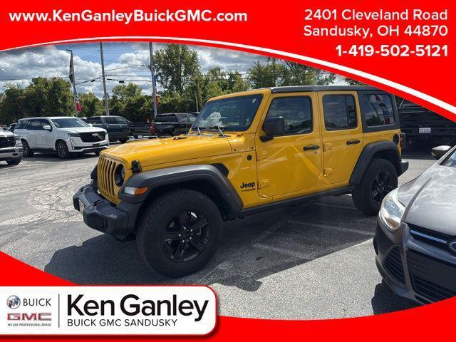 Photo of 2021 Baja Yellow Clearcoat Jeep Wrangler Unlimited