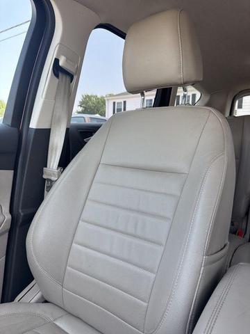 Photo of 2014 Ruby Red Tinted Clearcoat Ford Escape