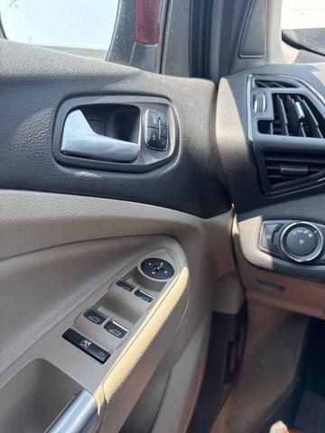 Photo of 2014 Ruby Red Tinted Clearcoat Ford Escape