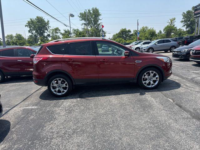 Photo of 2014 Ruby Red Tinted Clearcoat Ford Escape