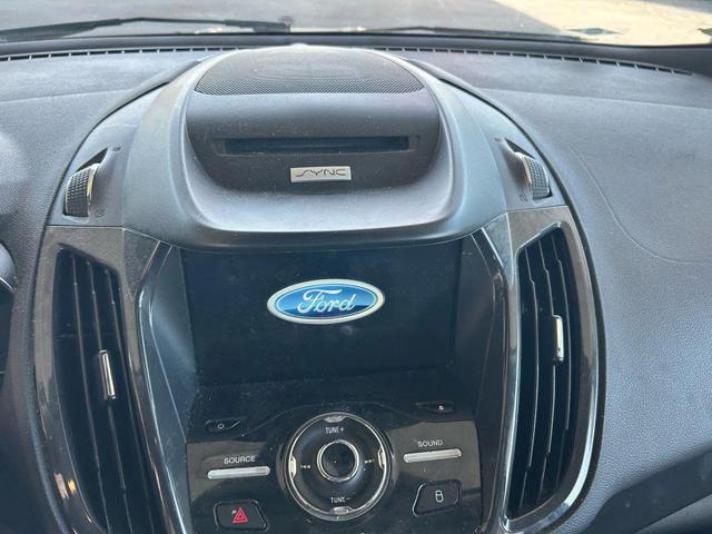 Photo of 2016 Ruby Red Metallic Tinted Clearcoat Ford Escape