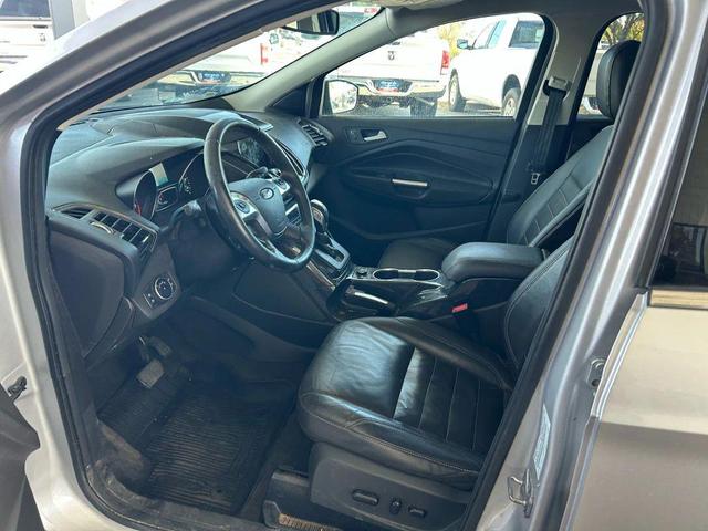 Photo of 2016 Ruby Red Metallic Tinted Clearcoat Ford Escape