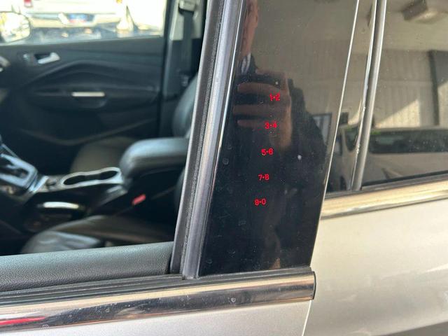 Photo of 2016 Ruby Red Metallic Tinted Clearcoat Ford Escape