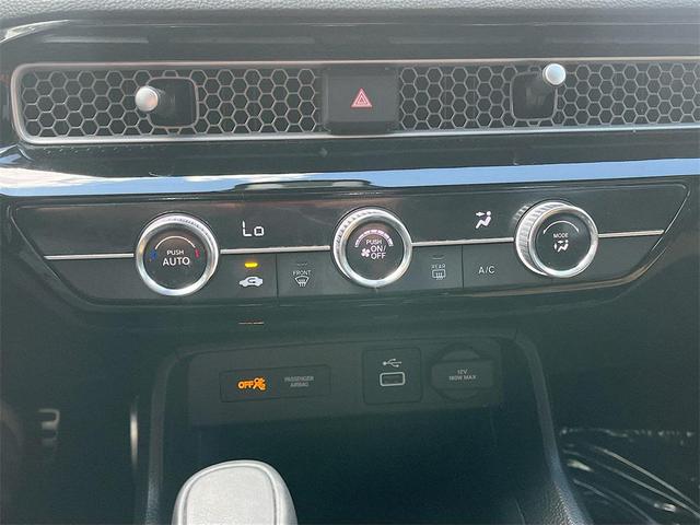Photo of 2024 Platinum White Pearl Honda Civic