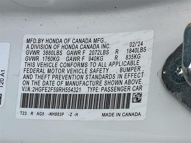 Photo of 2024 Platinum White Pearl Honda Civic