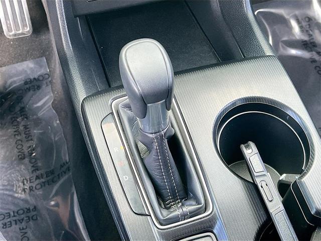 Photo of 2024 Boost Blue Pearl Honda Civic
