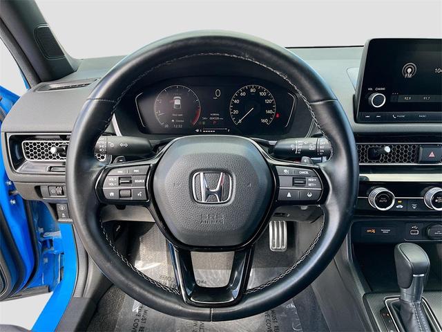 Photo of 2024 Boost Blue Pearl Honda Civic