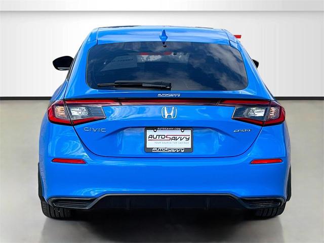 Photo of 2024 Boost Blue Pearl Honda Civic