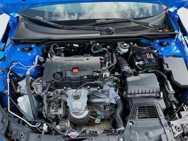 Photo of 2024 Boost Blue Pearl Honda Civic