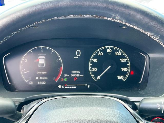 Photo of 2024 Boost Blue Pearl Honda Civic