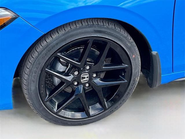 Photo of 2024 Boost Blue Pearl Honda Civic