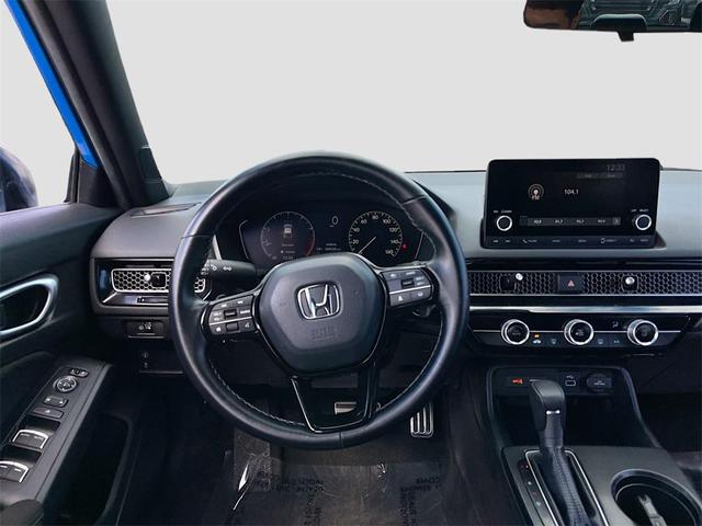 Photo of 2024 Boost Blue Pearl Honda Civic
