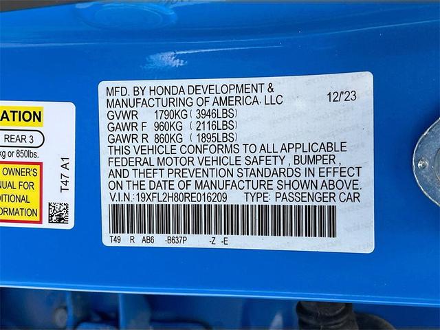 Photo of 2024 Boost Blue Pearl Honda Civic