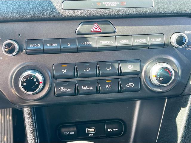 Photo of 2022 Black Cherry Kia Sportage