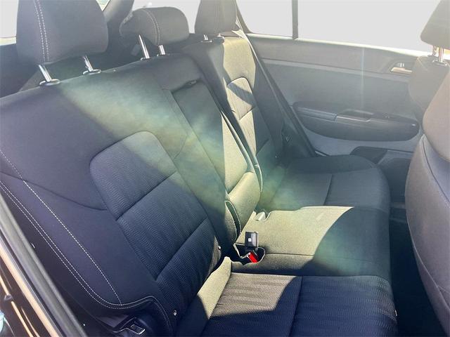 Photo of 2022 Black Cherry Kia Sportage