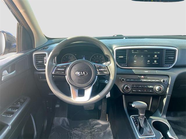 Photo of 2022 Black Cherry Kia Sportage