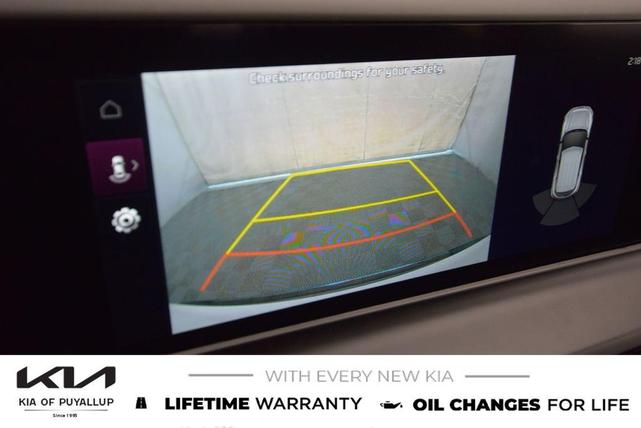 Photo of 2026 Clear White/Black Roof Kia Seltos