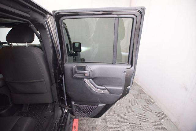 Photo of 2016 Black Clearcoat Jeep Wrangler Unlimited