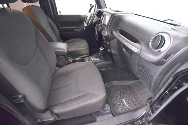 Photo of 2016 Black Clearcoat Jeep Wrangler Unlimited