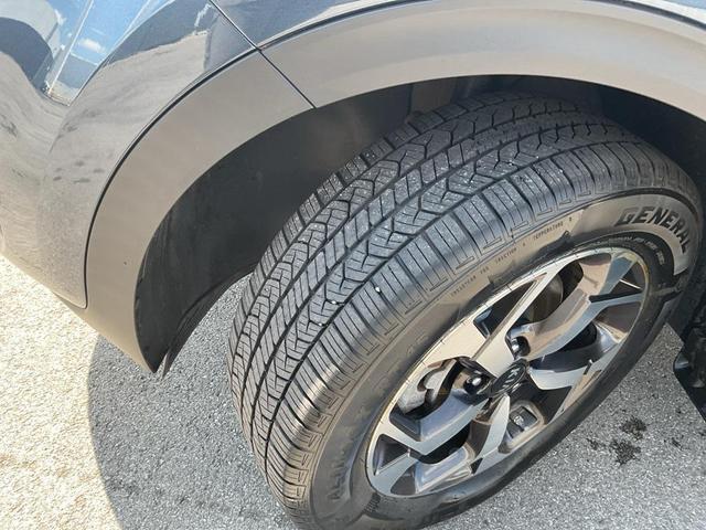 Photo of 2022 Pacific Blue Kia Sportage
