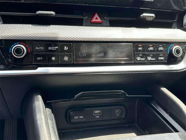 Photo of 2023 Steel Gray Kia Sportage Hybrid