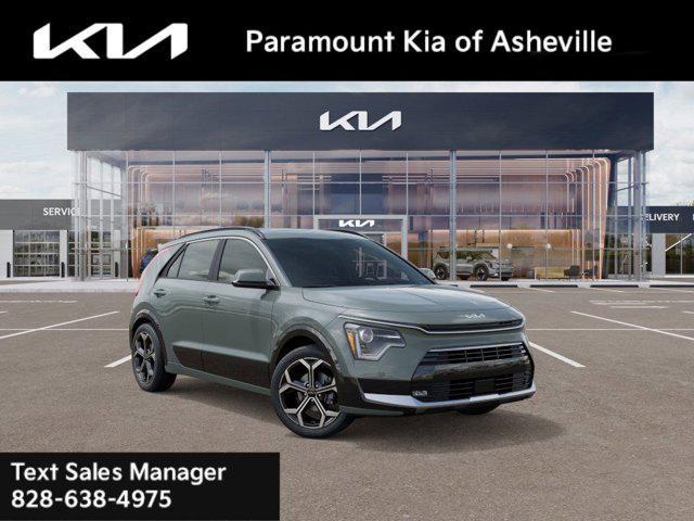 Photo of 2025 Cityscape Green Kia Niro