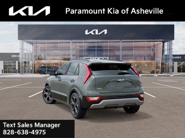 Photo of 2025 Cityscape Green Kia Niro