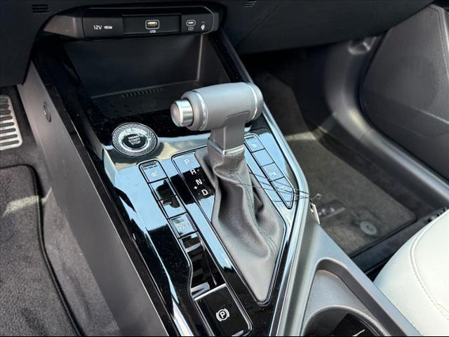Photo of 2025 Cityscape Green Kia Niro