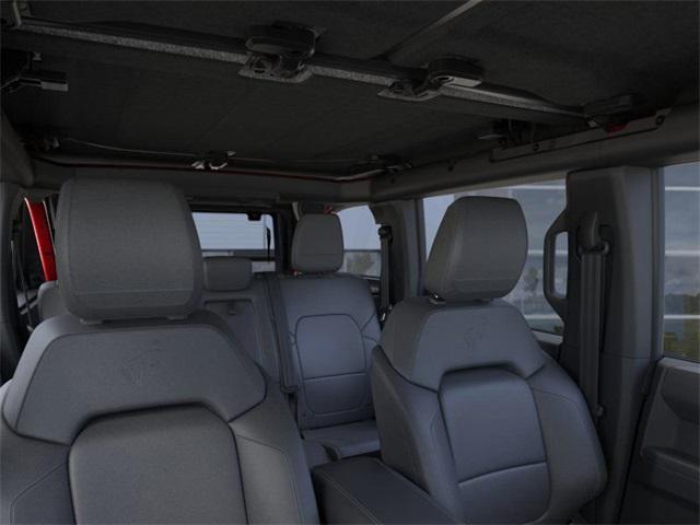 Photo of 2025 RUBY RED MET TNTD CLEARCOAT Ford Bronco